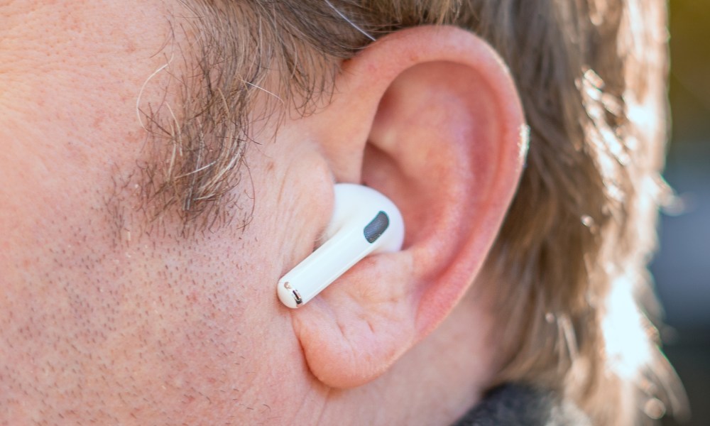 Apple AirPods Pro in a person's ear.