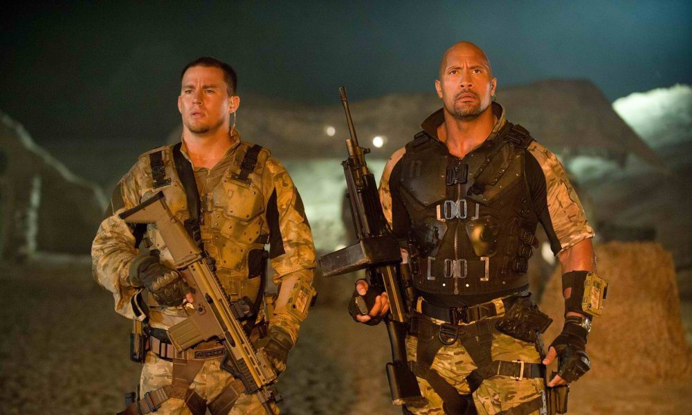 The Rock and Channing Tatum hold guns in G.I. Joe.