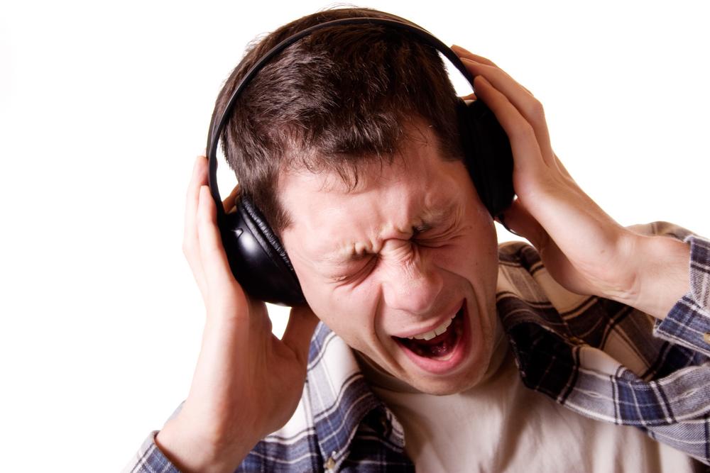 Listening to loud music best sale with headphones