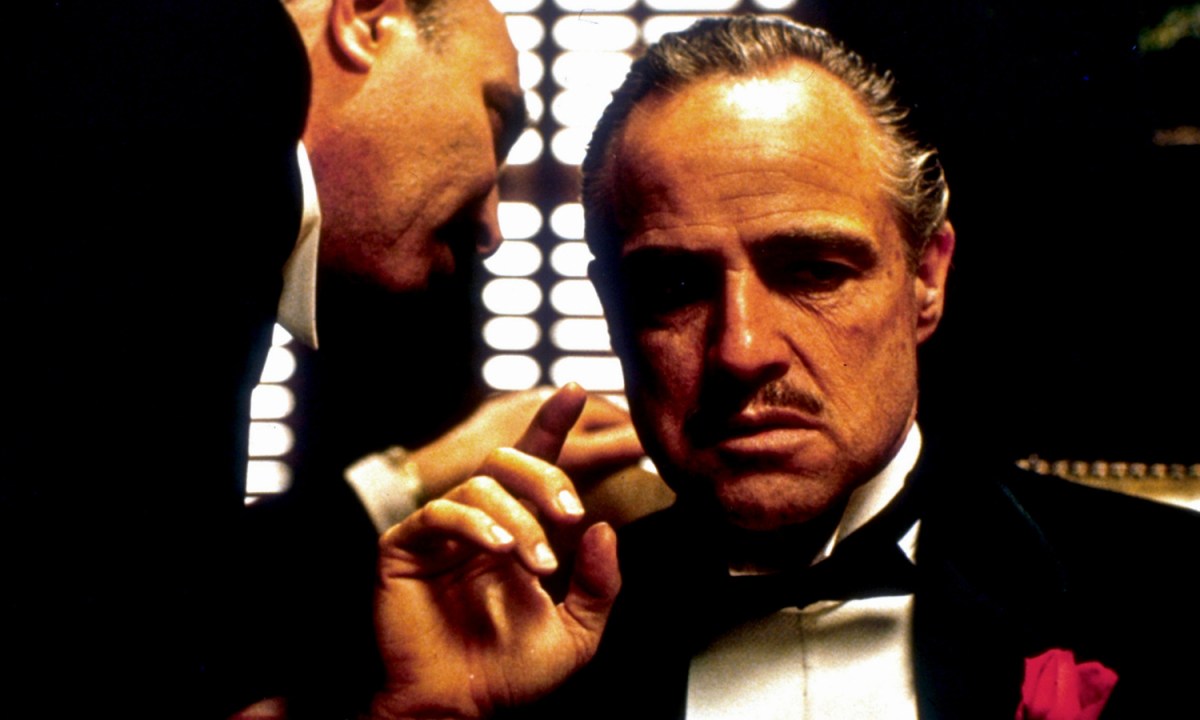 Marlon Brando listens to counsel in a scene from "The Godfather."