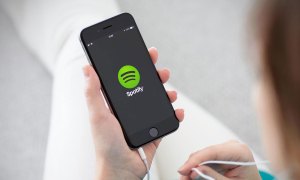 why i have to quit spotify app music earbuds headphones