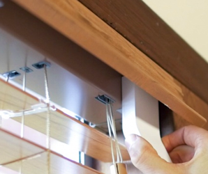 Installation of DIY smart blinds.