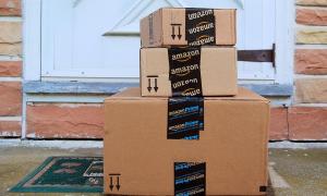 couple con amazon out of tech goods boxes