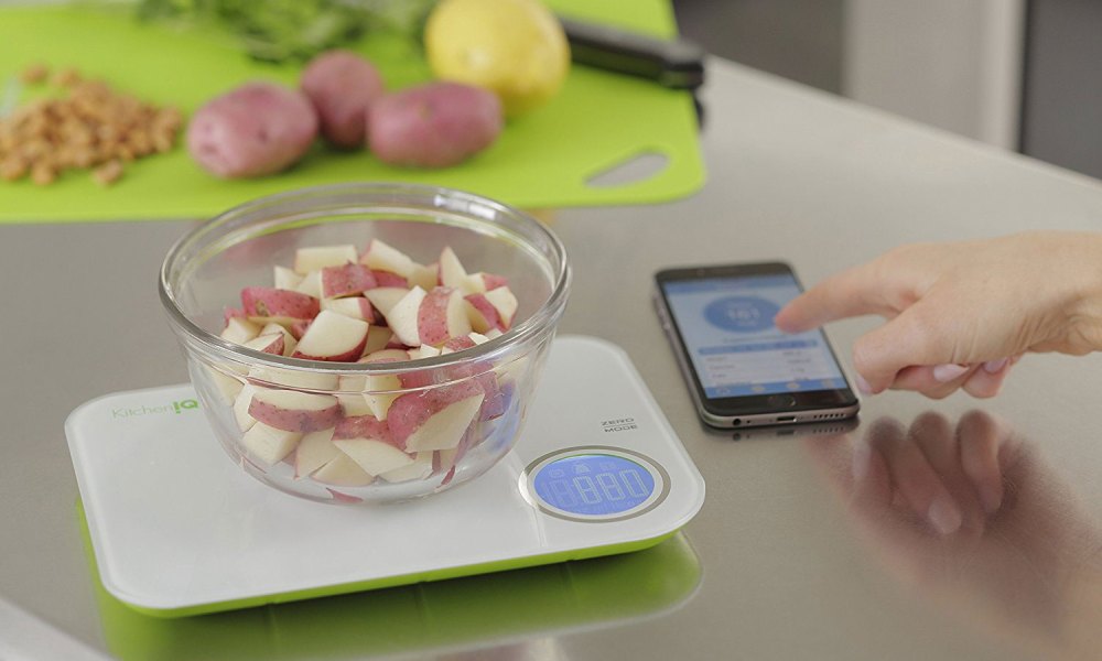 Food being measured with a kitchen scale.