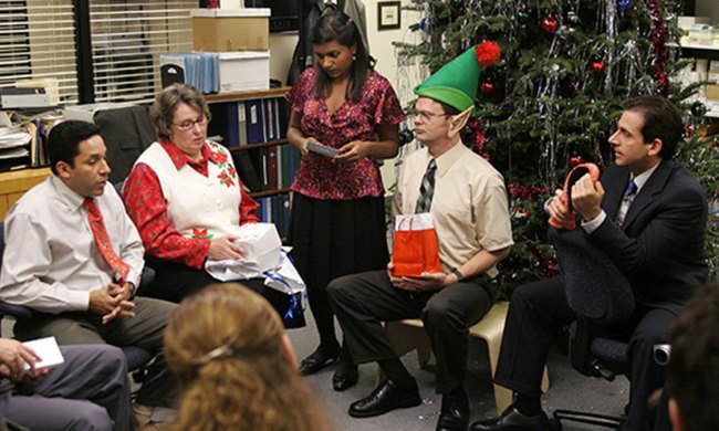 Oscar, Phyllis, Kelly, Dwight, and Michael at a Christmas Part in "The Office."