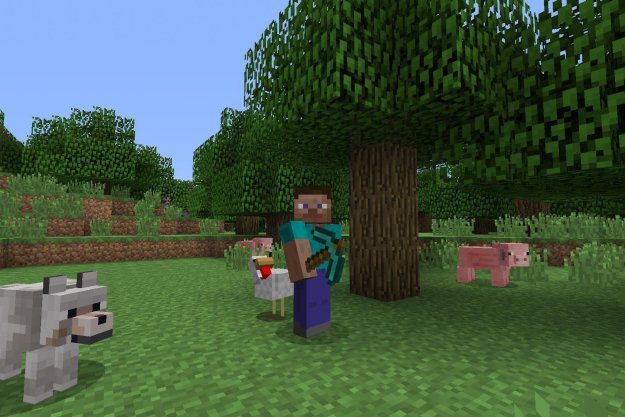 A Minecraft characters stands by a tree.