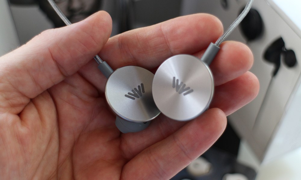 I.Am+ Buttons earbuds review in hand