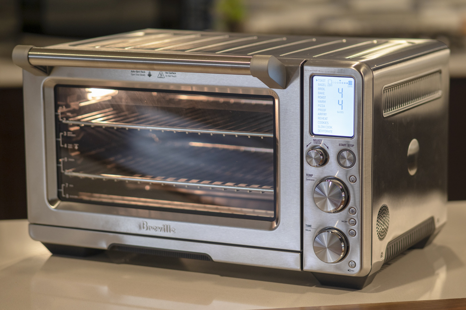 https://www.digitaltrends.com/wp-content/uploads/2018/05/breville-bov900bss-toaster-oven-1805.jpg?resize=1500%2C1000&p=1
