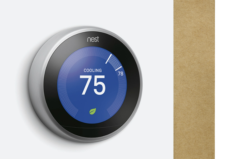 The Nest Learning Thermostat on a wall.