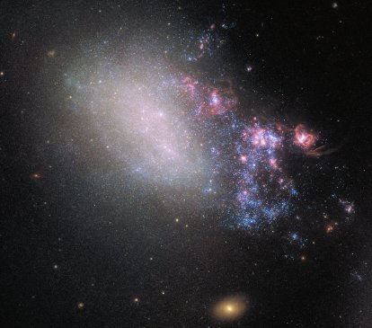 Two Galaxies Play Tug of War in This Spectacular Hubble Image | Digital ...