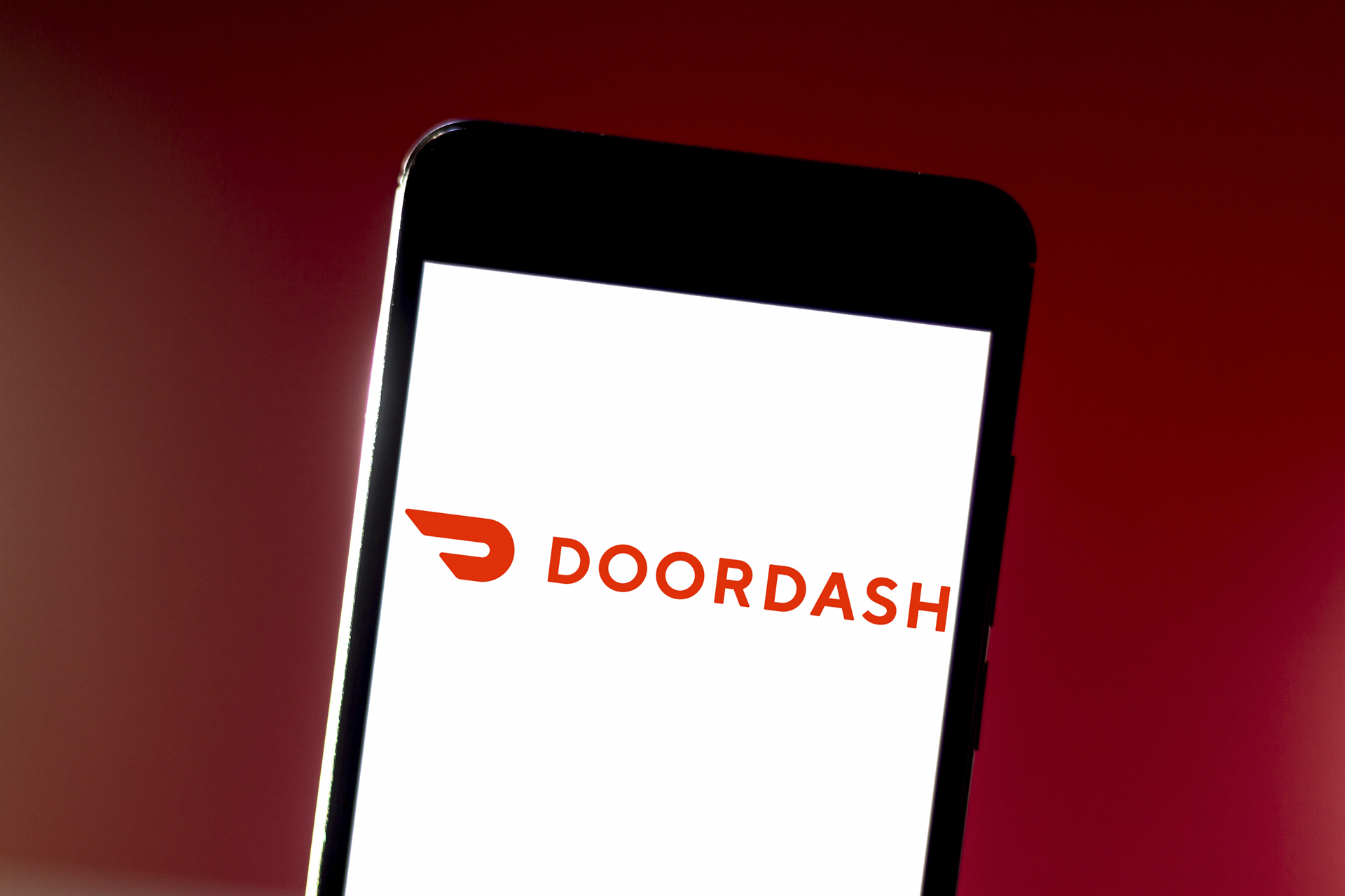 Нарушение DoorDash | Приложение Doordash на телефоне