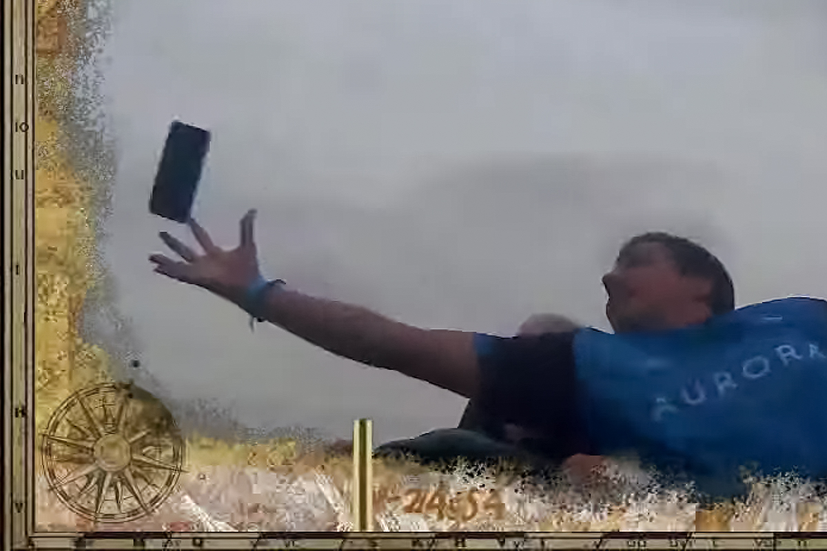 Watch This Guy Catch a Dropped iPhone During a Roller Coaster Ride