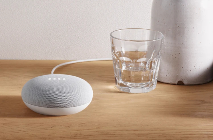 The Google Nest Mini on a table.