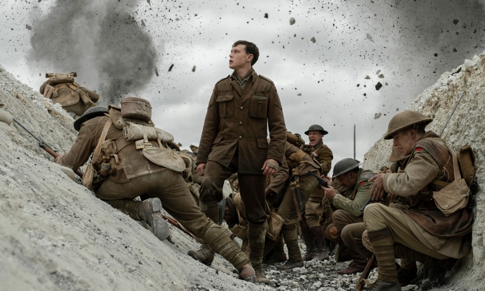 George MacKay as Schofield in a trench in a poster for "1917."