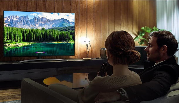 A family watching an LG TV.
