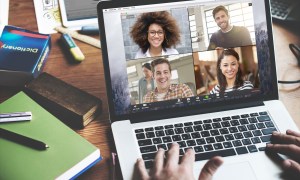 A user on a Zoom call with four other participants.