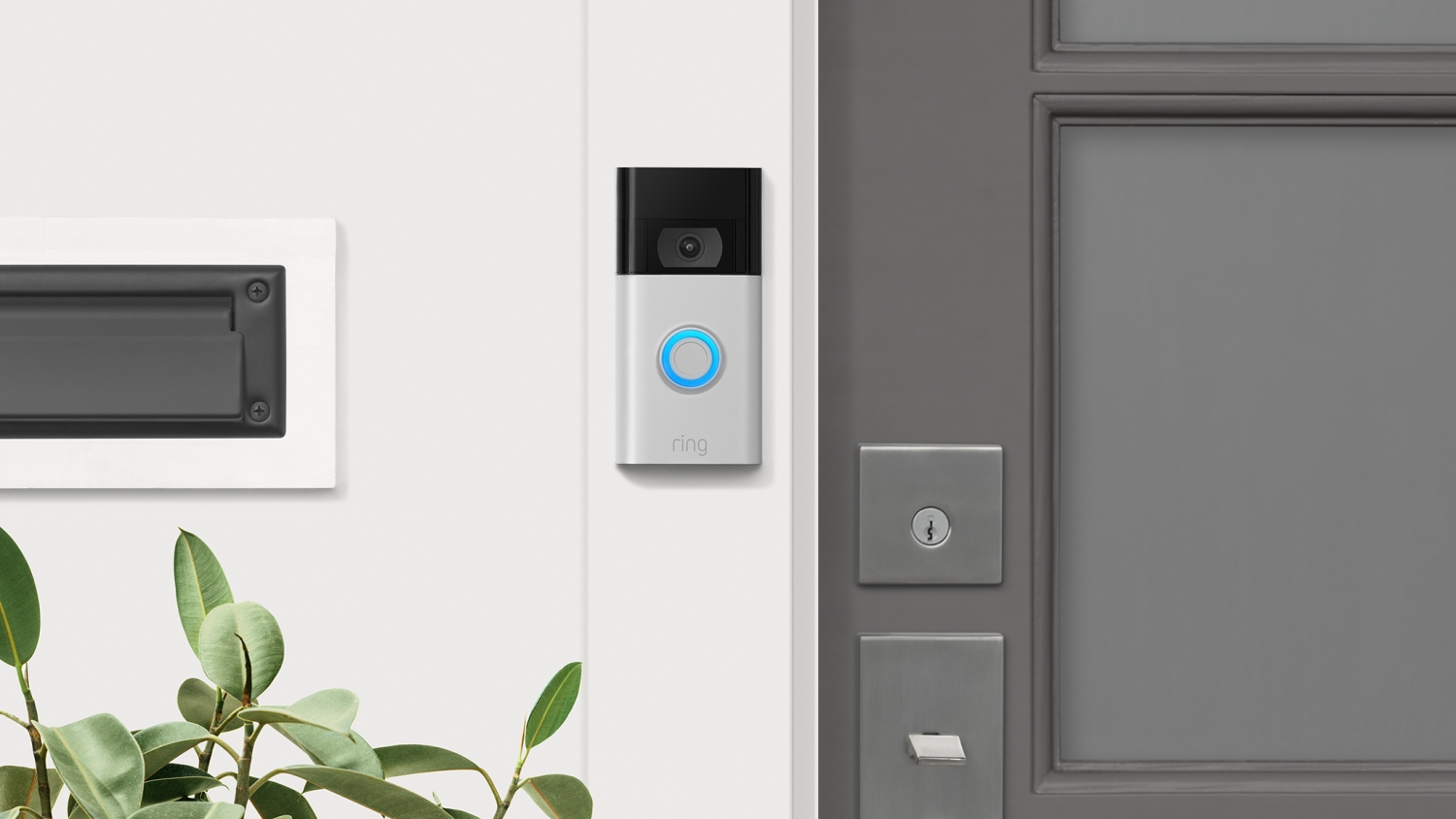 The second-generation Ring Video Doorbell outside a door.