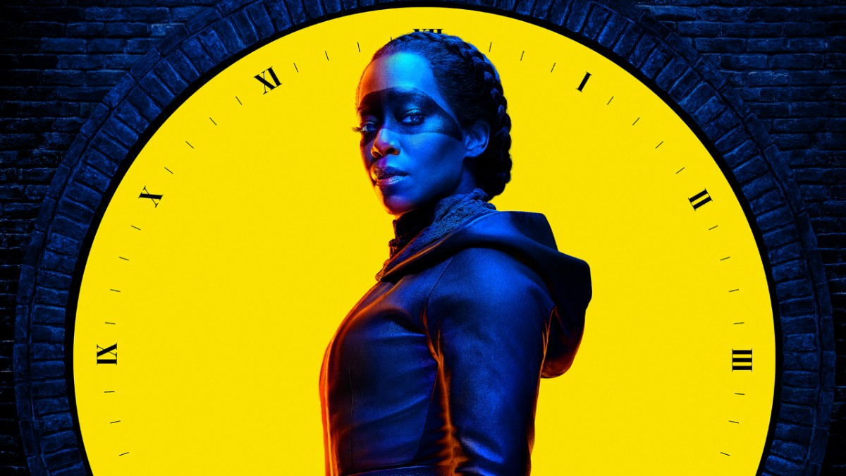 Regina King looking at the camera with a yellow clock behind her on a poster for HBO's Watchmen.
