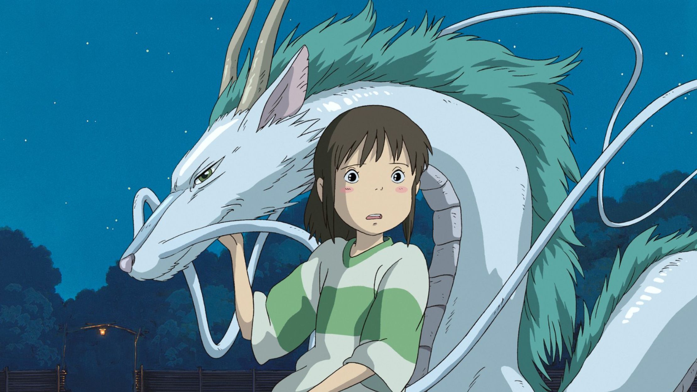 Chihiro with a dragon in Spirited Away.