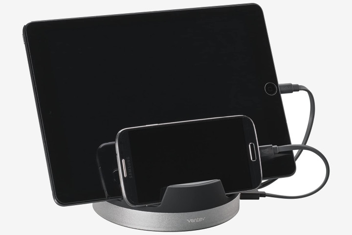 Picture shows a smartphone and a tablet resting in a Ventev Charging Hub