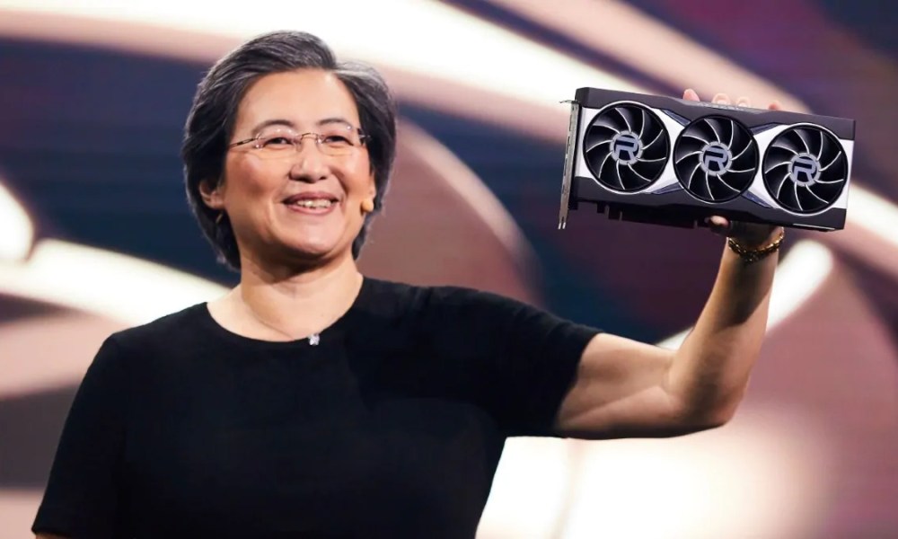 Lisa Su, the CEO of AMD, pictured holding an AMD Radeon RX 6900 XT graphics card.