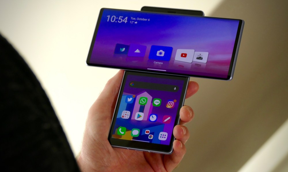 Someone holding the LG Wing, showing off both of its screens.