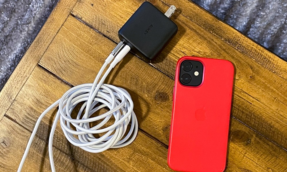 iPhone 12 Mini with charger