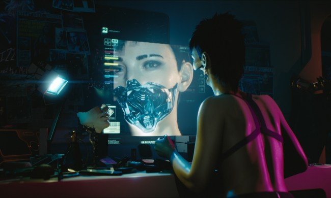 A hacker uses a computer in Cyberpunk 2077.