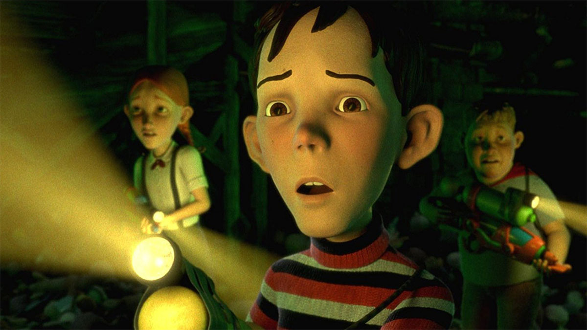 A boy and his friends hold flashlights in the dark in Monster House.