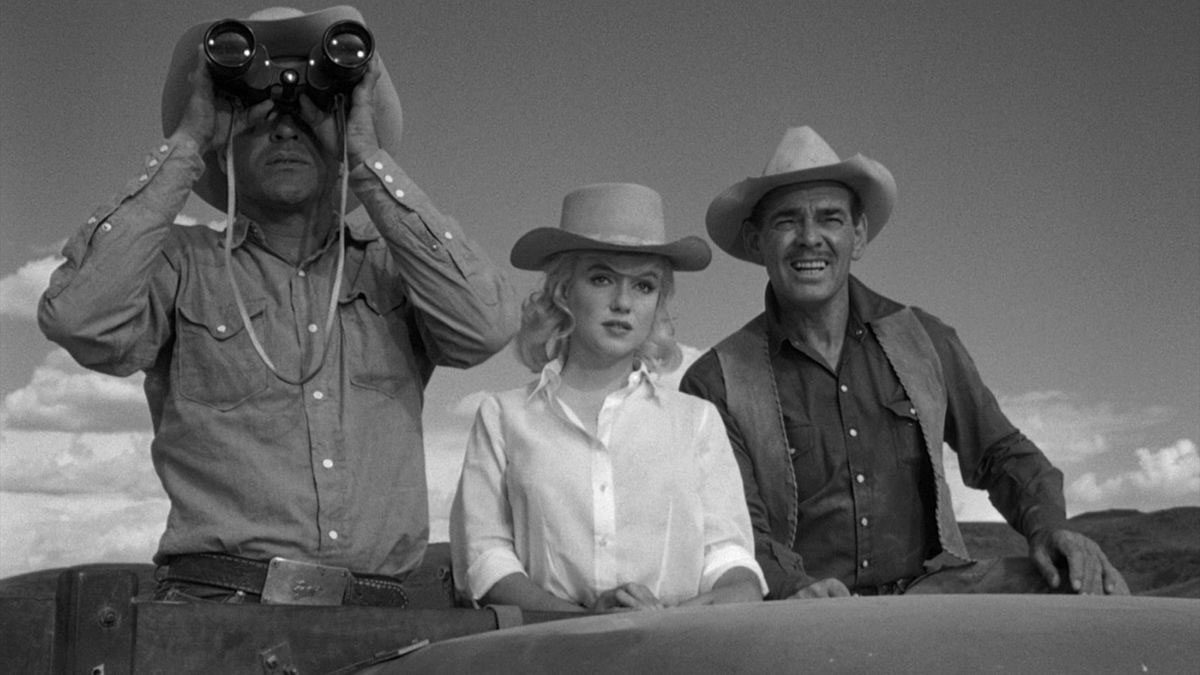 Montgomery Clift, Marilyn Monroe y Clark Gable uno al lado del otro en The Misfits