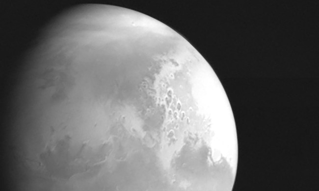 A black-and-white picture of Mars taken by Tianwen 1, the first snapshot from the Chinese craft.