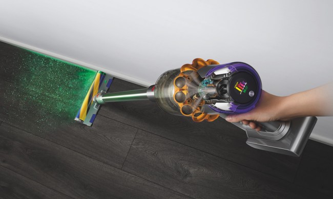 The Dyson V15 Detect cordless vacuum with its laser.