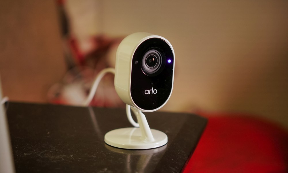 Arlo Essential Indoor Security Camera on table