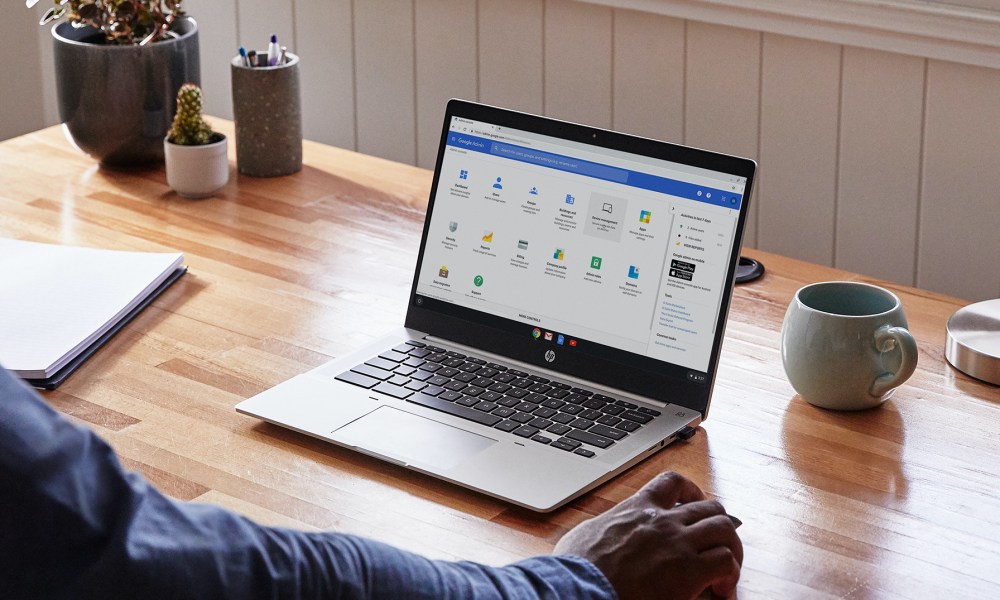 A HP Pro c640 Chromebook Enterprise laptop sitting atop a desk.