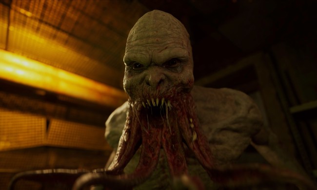 A mutant with a split jaw screams in Stalker 2.