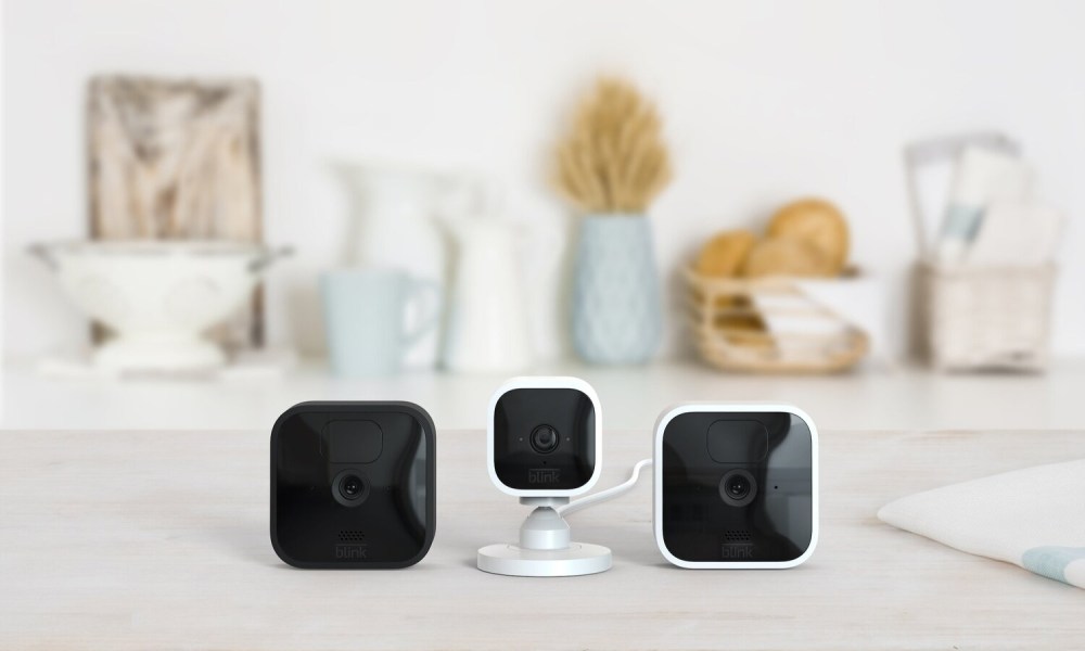 Blink Home System security cameras on a kitchen counter.