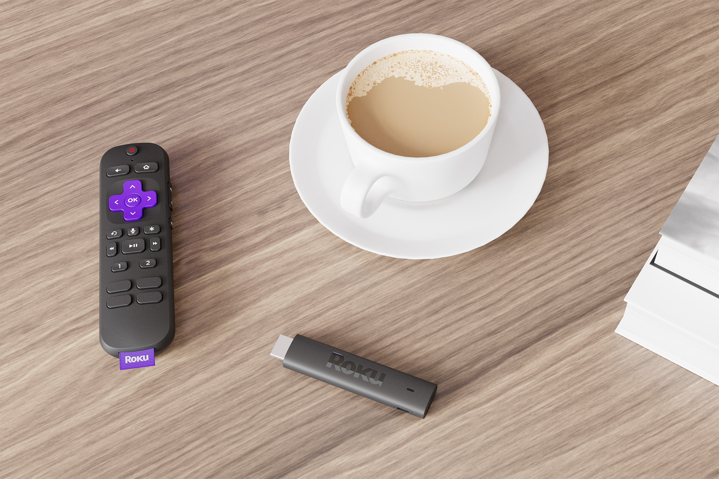 Roku Streaming Stick 4K and remote control on the coffee table.