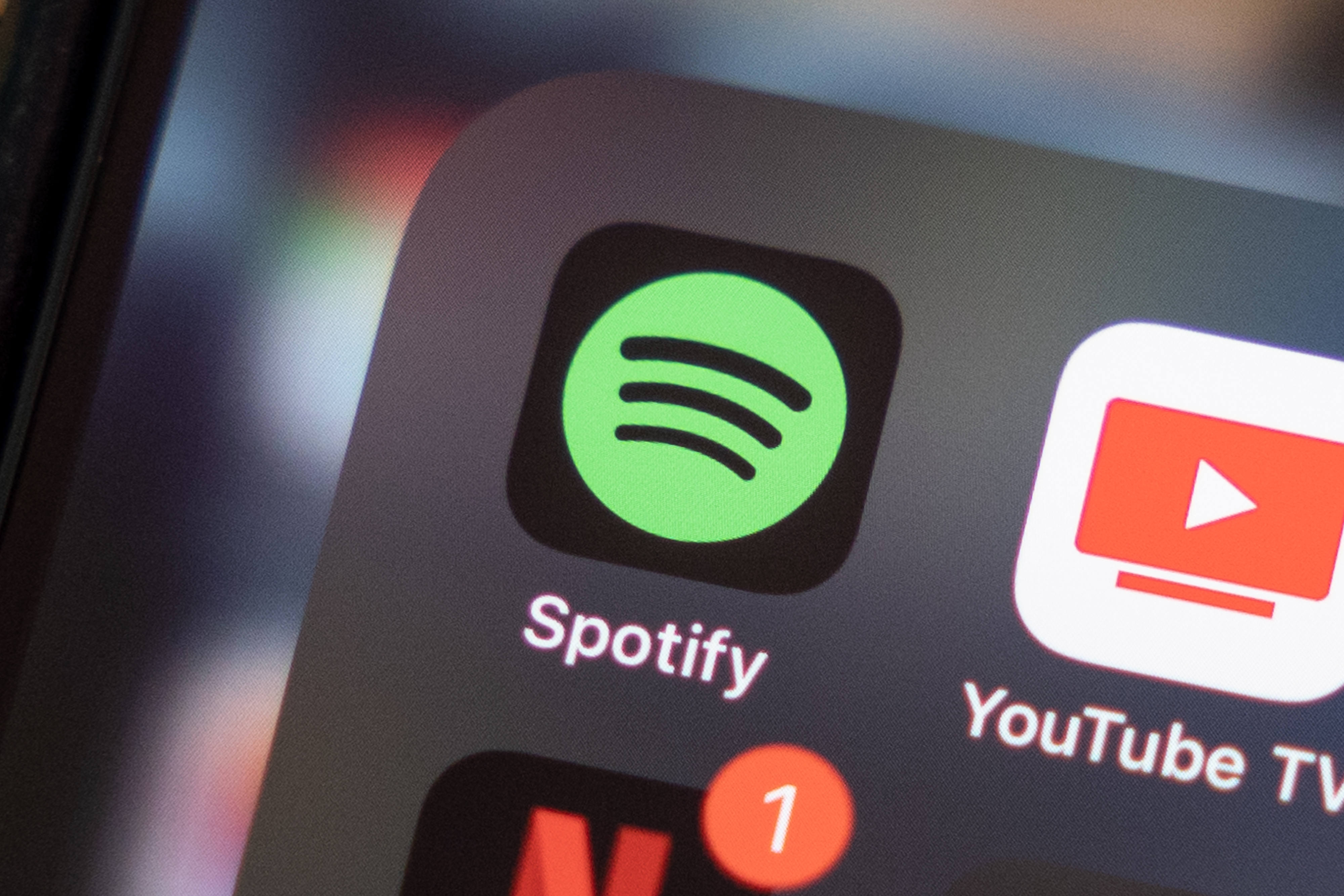 How do you buy sales spotify premium on iphone