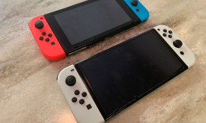 Original Switch next to Switch OLED.