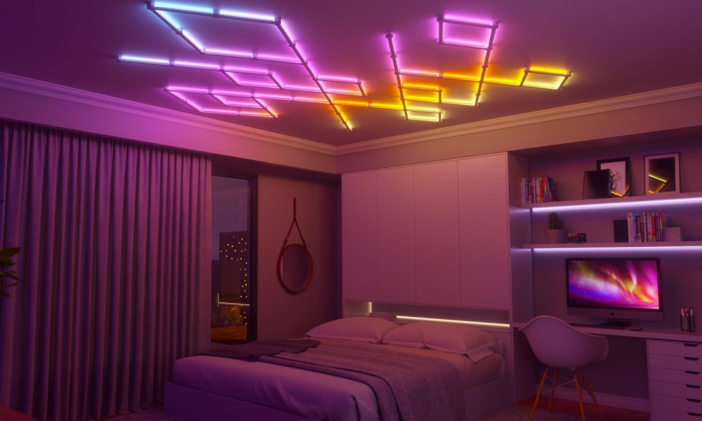 Nanoleaf Lines lights installed on the ceiling in a bedroom.