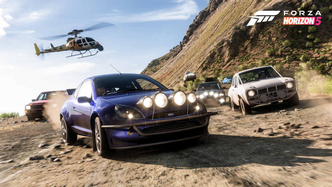 Forza Horizon 5 cars racing on dirt road.