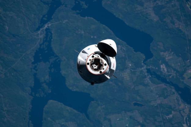 SpaceX's Cargo Dragon approaching the space station.