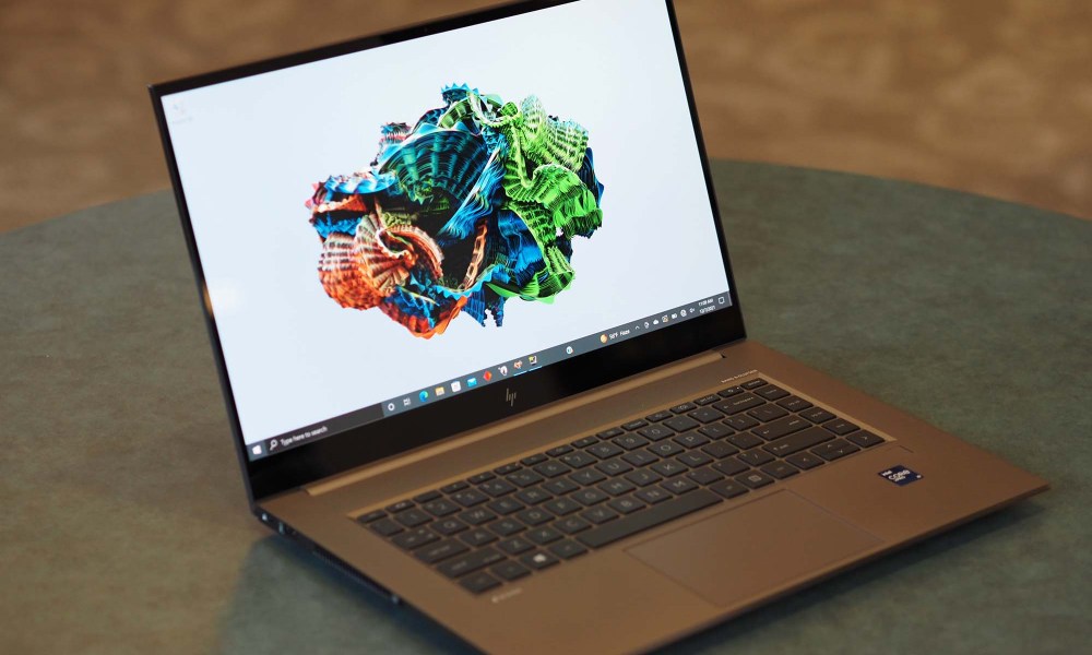 A HP ZBook Studio G8 sits on a table.