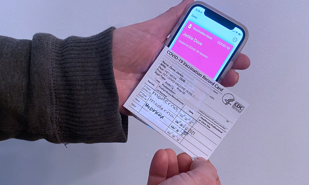 Covid-19 vaccine card and iPhone wallet card.