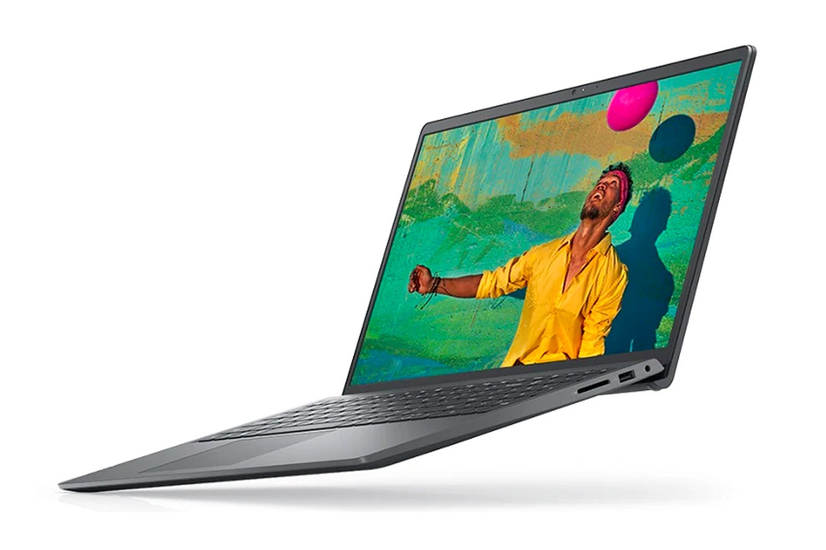 Ordinateur portable Dell Inspiron 15 3000 sur fond blanc affichant une scène colorée.