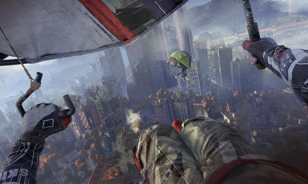 Players using the paraglider in Dying Light 2.