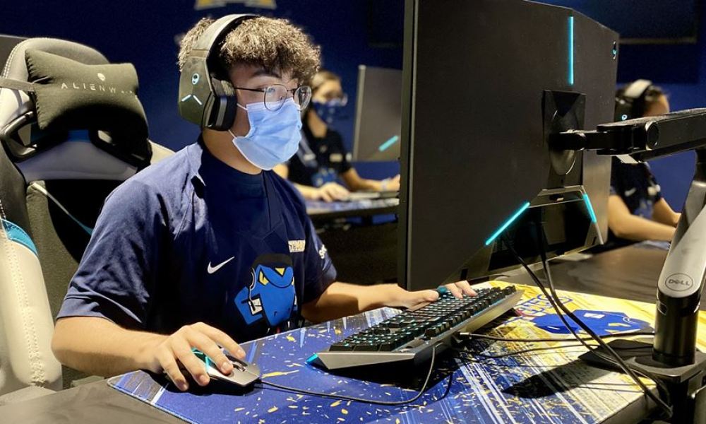 An esports player on St. Mary's esports team plays a game.