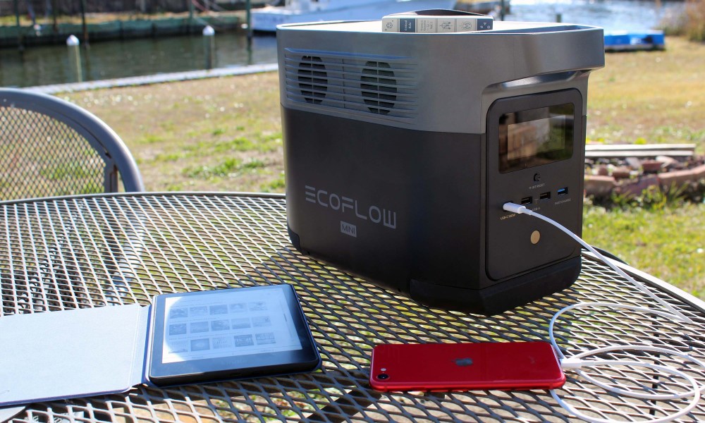 EcoFlow Delta Mini outside with devices connected.