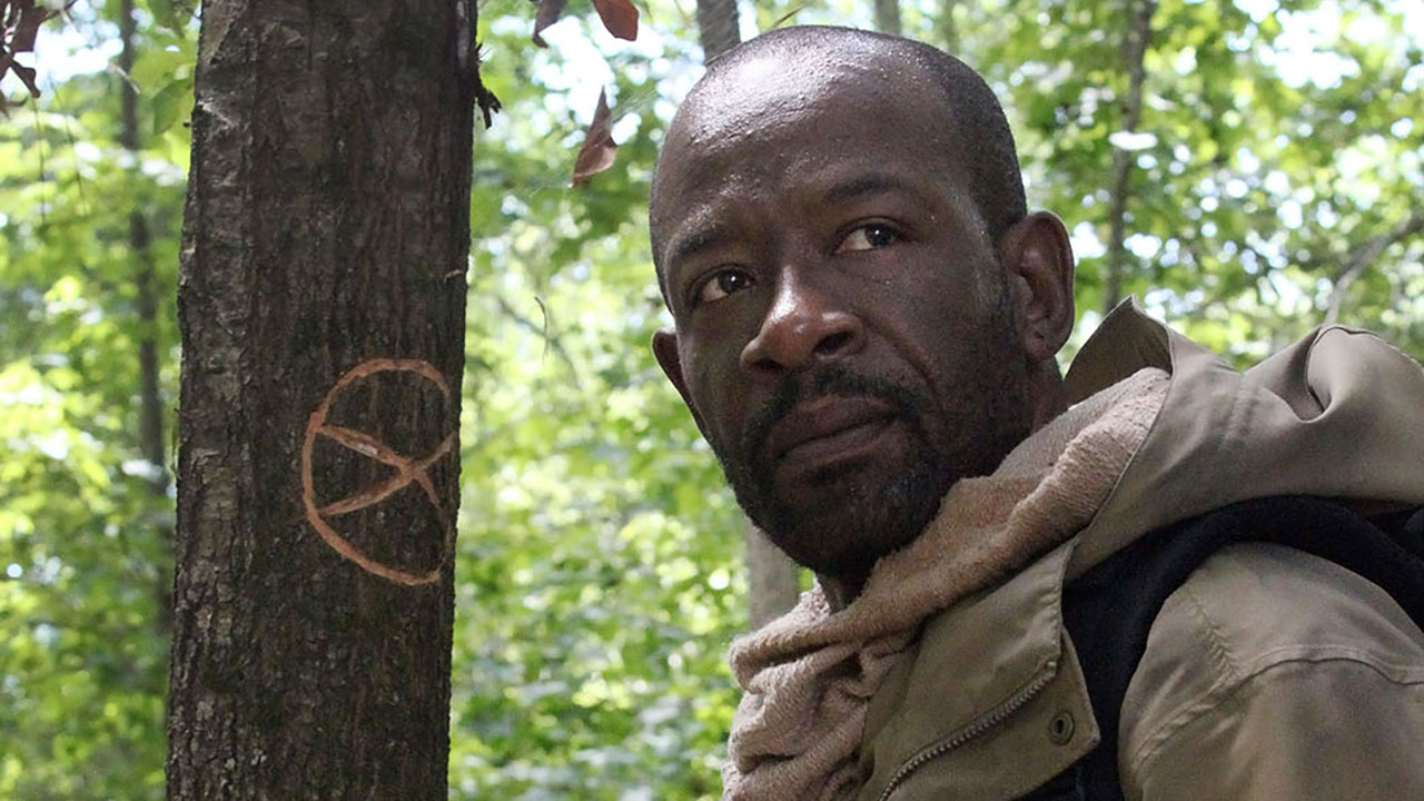 Morgan standing by a marked tree on The Walking Dead.