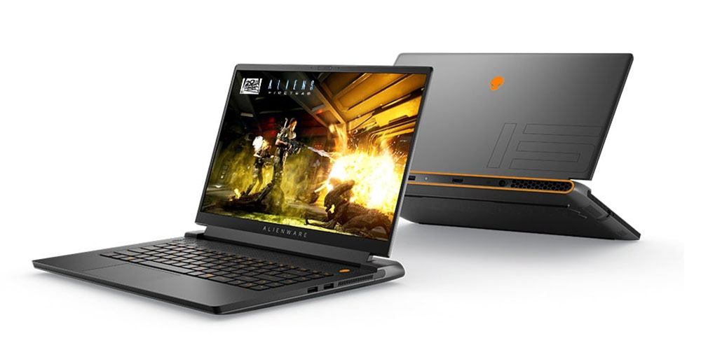 Two Alienware m15 R6 gaming laptops with one placed forward displaying Aliens: Fireteam Elite and the other faced backwards so you can only see the bezel.